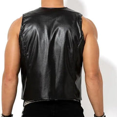 shirtless muscled gay man wearing a black barback glam vest mesh and faux leather club top standing in studio lighting showing chest shoulders and torso pridevoyageshopcom gay men’s gym tank tops mesh tank tops activewear clubwear fashion tops