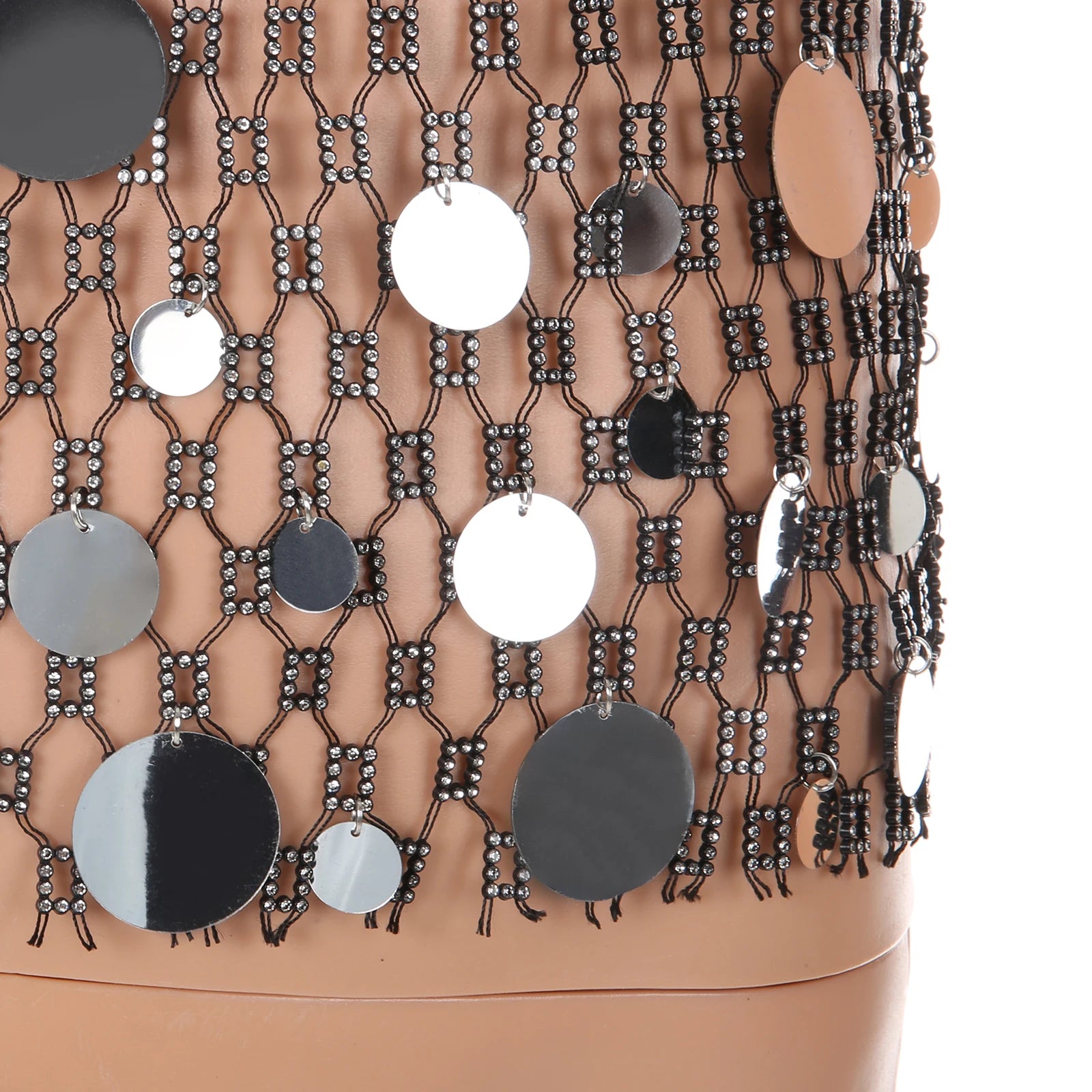 silver coinmail tank flat lay with metal disc mesh and chain drape detailing – pridevoyageshop.com – gay men’s harness, lingerie and fetish wear