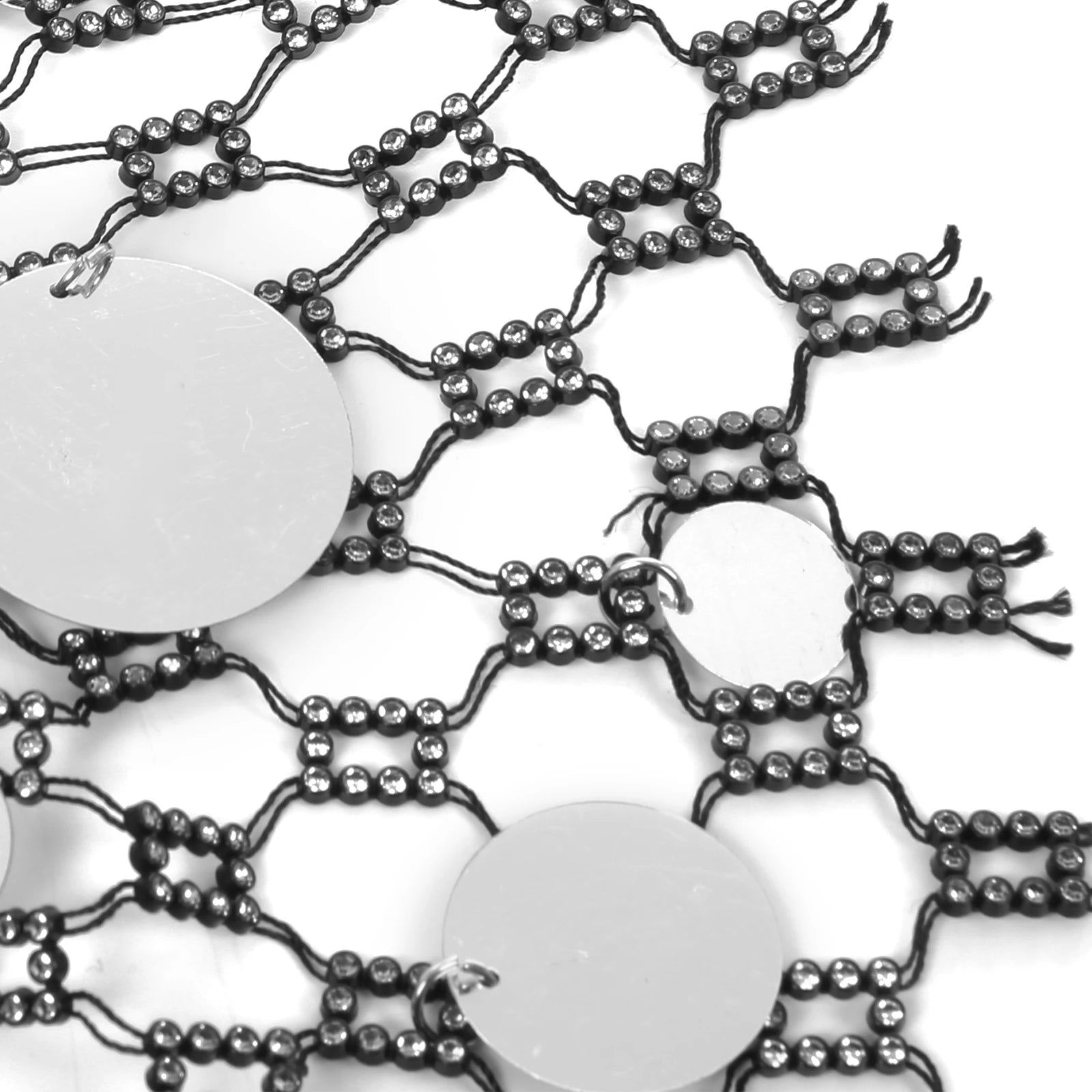 silver coinmail tank flat lay with metal disc mesh and chain drape detailing – pridevoyageshop.com – gay men’s harness, lingerie and fetish wear