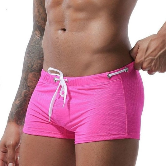 hot gay man in pink Gay Swimwear & Beachwear | Men's Bowtie Tight Swim Trunks - pridevoyageshop.com - gay men’s underwear and swimwear