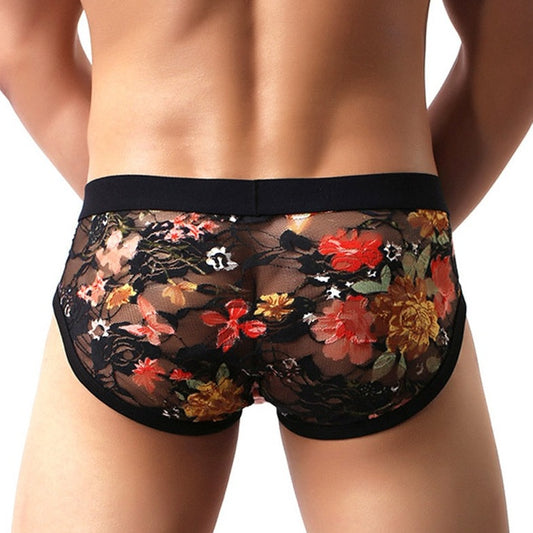 back of a man in Floral Lace Briefs: Exquisite Lace Underwear & Lingerie for Men - pridevoyageshop.com - gay men’s underwear and swimwear