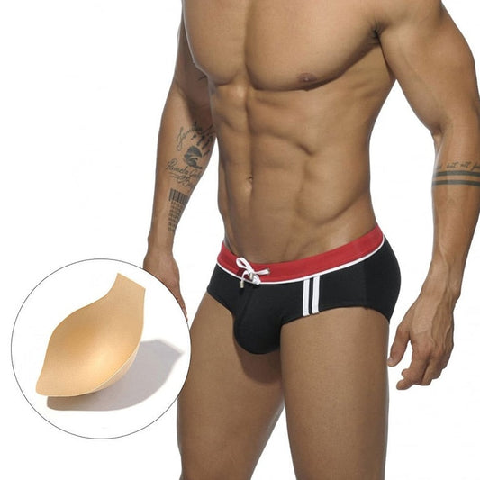 sexy gay man in black Gay Swimwear | Side Stripe Swim Briefs- pridevoyageshop.com - gay men’s underwear and swimwear